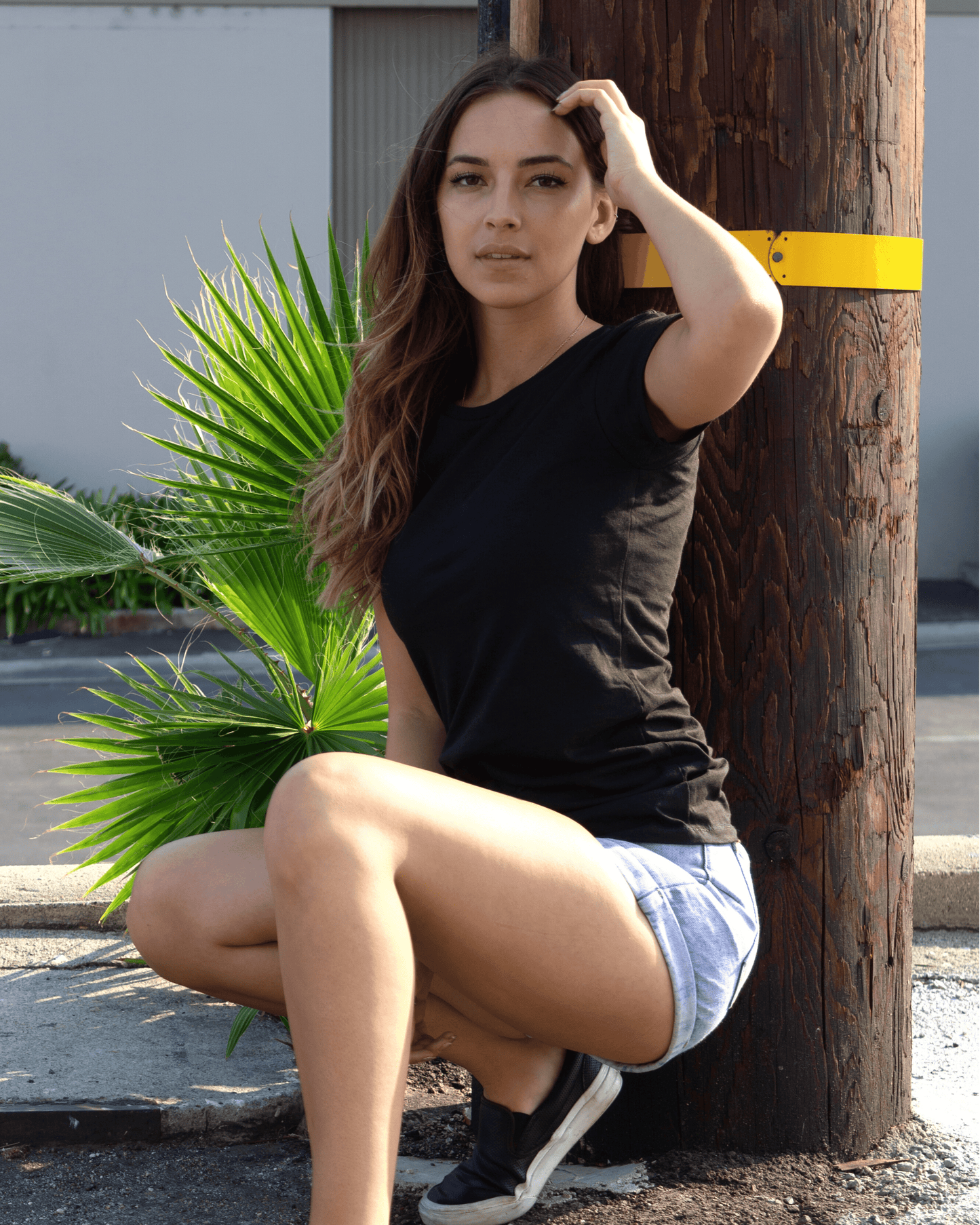 Woman wearing a Black Suna Cotton® Ladies Junior Fit T-shirt