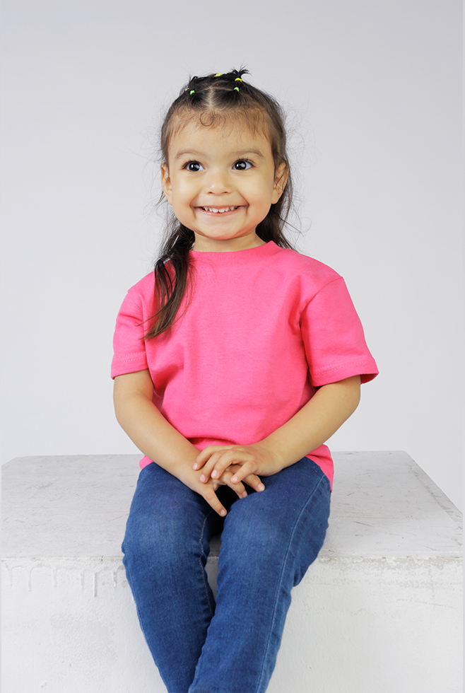 An infant wearing Suna Cotton® Hot Pink Infant Tee