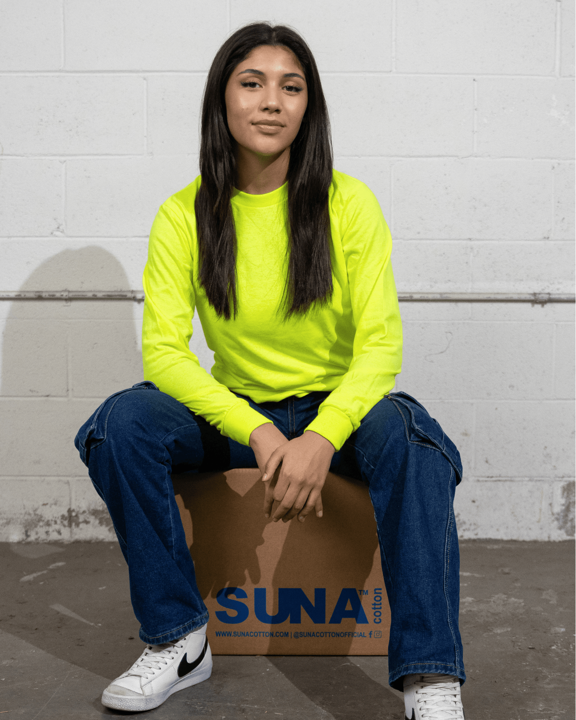 Woman wearing Suna Cotton® Safety green Long Sleeve T-shirt
